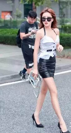 高挑包臀裙白皙大長腿氣質墨鏡美女
