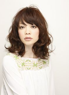 橘仁美