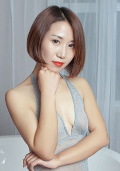 嫣然